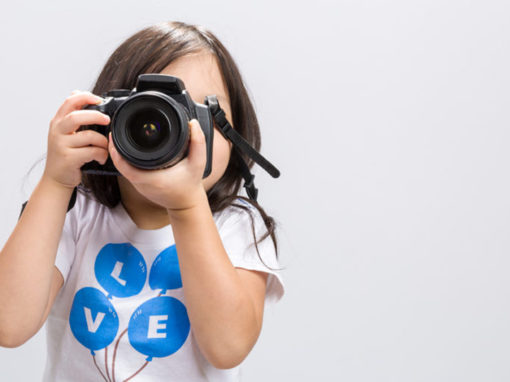 girl holding a camera